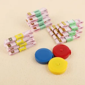 Set di metro a nastro flessibile con metri a nastro retrattili per cucito e misurazione del corpo.