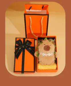 Cute capybara plush toy gift box set with floral wreath, perfect present for kids and girls.