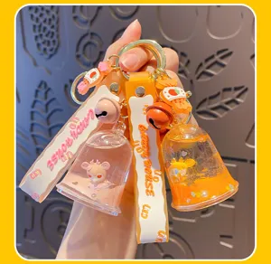 Niedlicher Glitzer-Schlüsselanhänger mit süßem Hirsch, Glocken und stylischem Candy-Gurt.