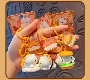 Detailed close-up of cute cartoon dog keychains with fun sushi and burger designs for bags.