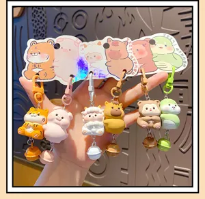 Cute 12 Chinese zodiac cartoon keychains with bells, creative bag pendants and accessories.
