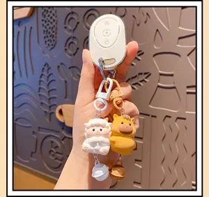 Cute zodiac cartoon animal keychain charm with bells, creative couple bag pendant accessory.