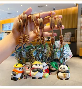 Cute cartoon panda keychain detail shot showcasing intricate Jianghu style doll accessories.