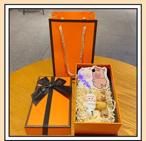 Cute zodiac couple keychain set with orange gift box, perfect healing bag charm pendant.