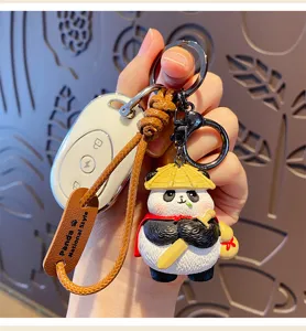 Cute cartoon panda keychain Jianghu style bag pendant metal ring leather strap charm.