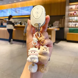 Cute zodiac plush couple keychain with creative cartoon doll pendant and car key case decor.