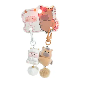 Cute zodiac animal couple keychain plush pendant set with fluffy ball and metal clasp.