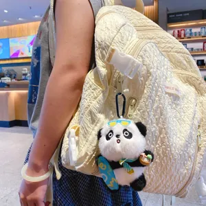Cute panda plush toy keychain and backpack pendant with skateboard for stylish bag decoration