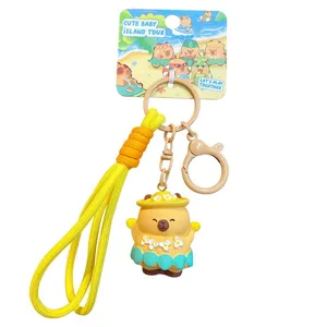 Cute capybara keychain with yellow strap and island theme backing card for school bag.