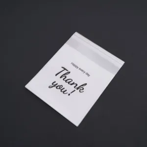 Close-up detail view of frosted clear self-sealing plastic packaging bag with custom print text.
