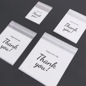 Transparent self-sealing plastic bags with thank you print for cookies and jewelry storage.