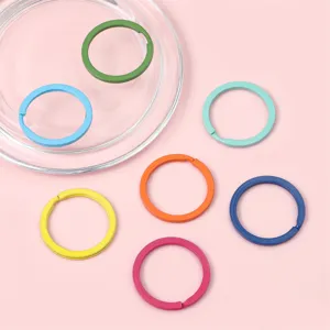 Colorful painted flat key rings detail view, perfect for DIY bag charms and crafts.
