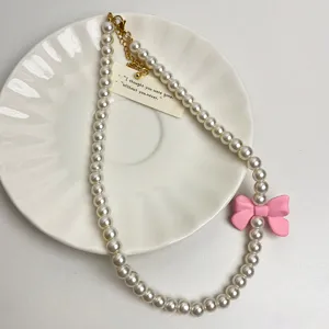 Parelketting met roze strik zoete sleutelbeenketting niche ontwerp trendy mode sieraden