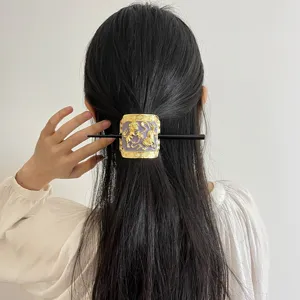 Chinese style metal drop-glaze hair stick detail, elegant purple and gold bun hairpin for women.