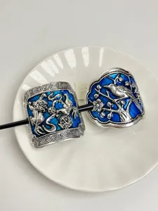 Vintage cloisonne enamel hair stick with traditional Chinese motifs, exquisite retro accessory.