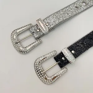 Detailed view of sparkling rhinestone western belts with crystal buckles and glitter strap.