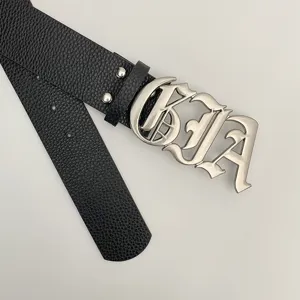 Detailed view of the Y2K vintage gothic letter buckle leather belt with lychee pattern.