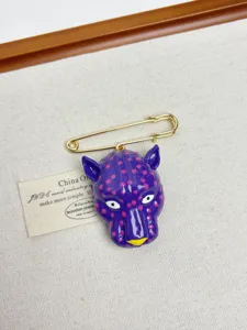 Retro enamel purple leopard head brooch detail, unique style pin for vintage fashion outfits.