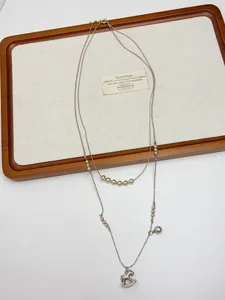 Dubbellaagse parelketting met zirkonia schommelpaard hanger elegante halsketting voor vrouwen