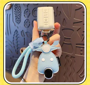 Kreativer Leder Roller Auto Schlüsselanhänger Anhänger mit geflochtenem Gurt für Handtaschen.