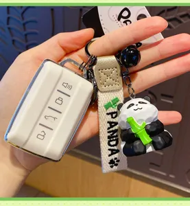 Cute resin panda keychain detail, exquisite bamboo panda pendant with strap and key case.