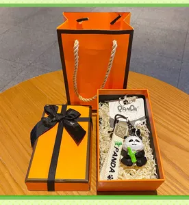 Cute resin panda keychain charm with bamboo figure and wrist strap in gift box set.