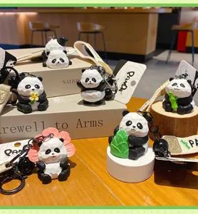 Resin wood-style panda keychain, cute creative bamboo-holding panda bag pendant detail display.