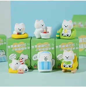 Detail shot of cute resin West Highland dog figurines, perfect for desktop and car decor.