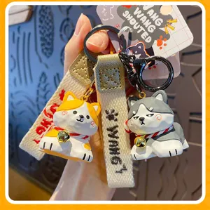 Cute wood-carving style dog keychain detail, creative cartoon backpack hanging accessory