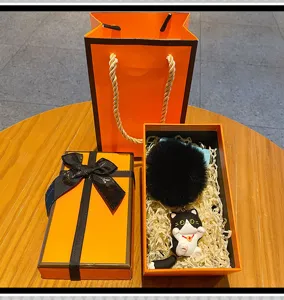 Cute cat keychain plush pom pom pendant set with luxury gift box stylish bag charm for women