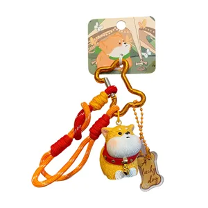 Cute fluffy fat dog keychain with woven lanyard and cute resin puppy doll pendant for school bags.