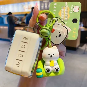 Cute West Highland White Terrier keychain with lazy dog figurine, backpack pendant and car key case.