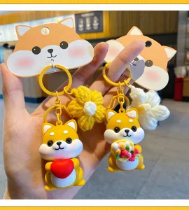 Schattige cartoon Shiba Inu sleutelhanger met garen bloem hanger, perfect accessoire voor tas.