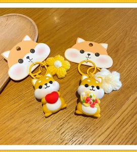 Schattige Shiba Inu sleutelhanger met hart en bloem hangers, leuke tasbedel en autosleutelhanger.