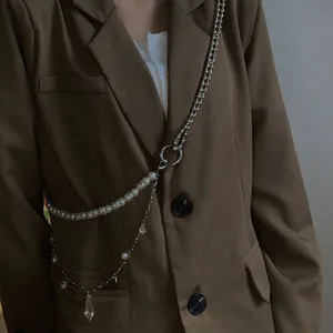 Trendy double layer pearl body chain with drop pendant, cool hip hop style fashion jewelry detail.