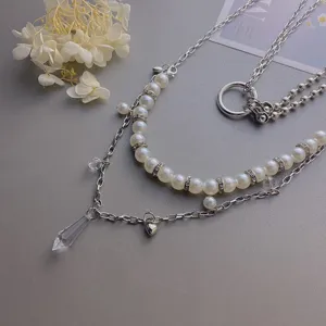 Trendy hip-hop cool multi-layer pearl waist chain with crystal water drop and heart pendant.