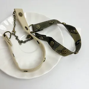 Punk style camouflage and canvas choker necklace with metal chains and vintage cross buttons.