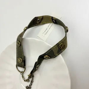 Punk style camo choker necklace for women with vintage metal buttons and chain accessory detail.