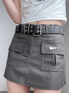 Women punk cargo mini skirt paired with double grommet star belt stylish streetwear