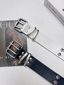 Punk double prong leather belt for women featuring star eyelets and stylish detail shot