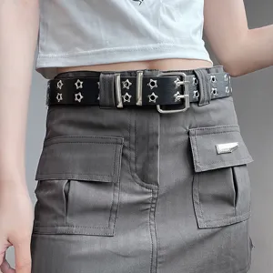 Punk style black double grommet belt with star eyelets for women, cool streetwear leather waist accessory.