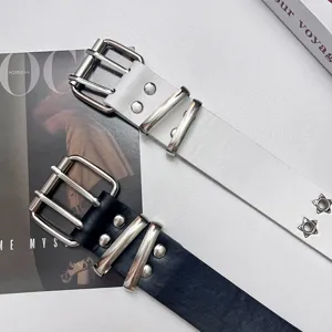 Punk style women wide leather belt with double pin buckle and star eyelet decoration.