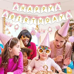 Pink princess castle birthday party decoration set with happy birthday banner and party hats for kids.