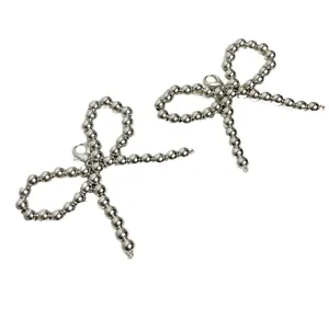 Silver metal beaded bow shoe clips decorative accessories for women sneakers and casual shoes.