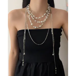 Retro multi-layer pearl tassel necklace detail shot, elegant clavicle chain design for women.