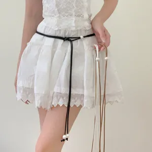 Minimalist thin leather rope pearl waist belt, adjustable stylish accessory for women.
