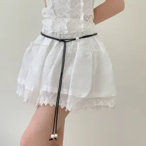 Fashion minimalist black leather rope waist chain with elegant pearl accents for women style.
