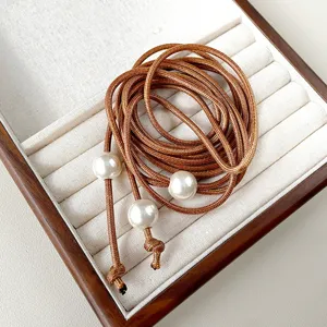 Elegant brown braided leather rope waist chain with white pearls for women chic belt accessory