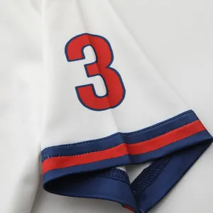 Close-up product detail showcasing the cheering uniform sleeve with bold number print and cuffs.