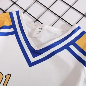 Kids cheerleading uniform collar detail view showing size 130 and material composition.